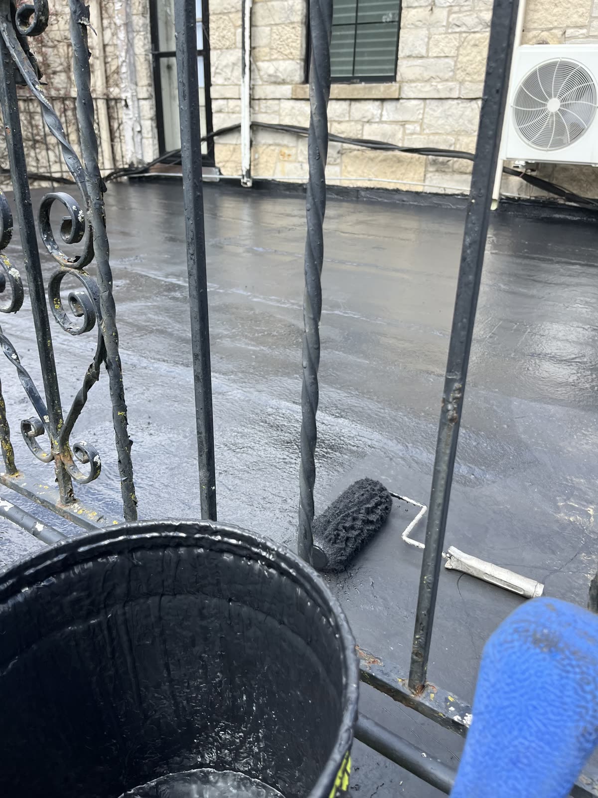 Gaco Silicone Roof Coating being applied to Winnetka flat roof