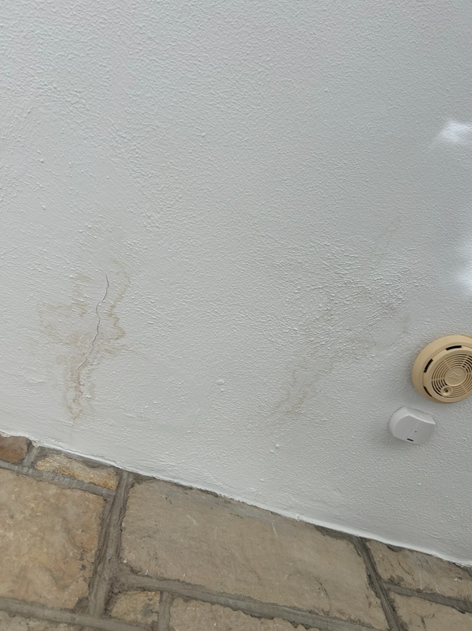 Ceiling cracks with water staining next to smoke detector, Winnetka IL