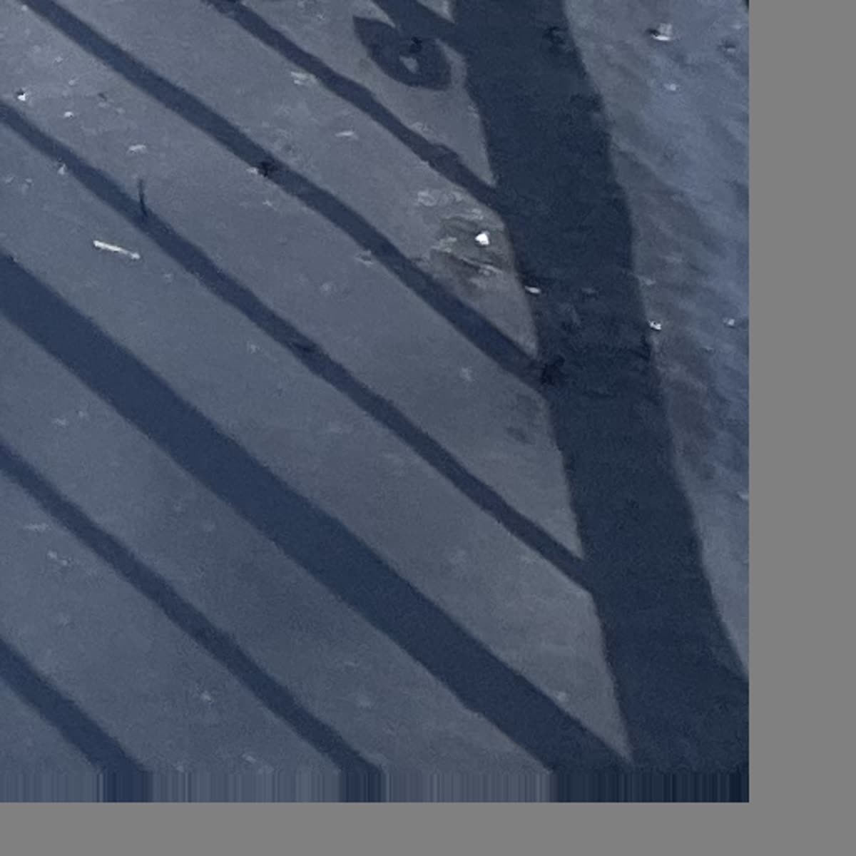 Completed Gaco silicone coating on Winnetka balcony roof with railing