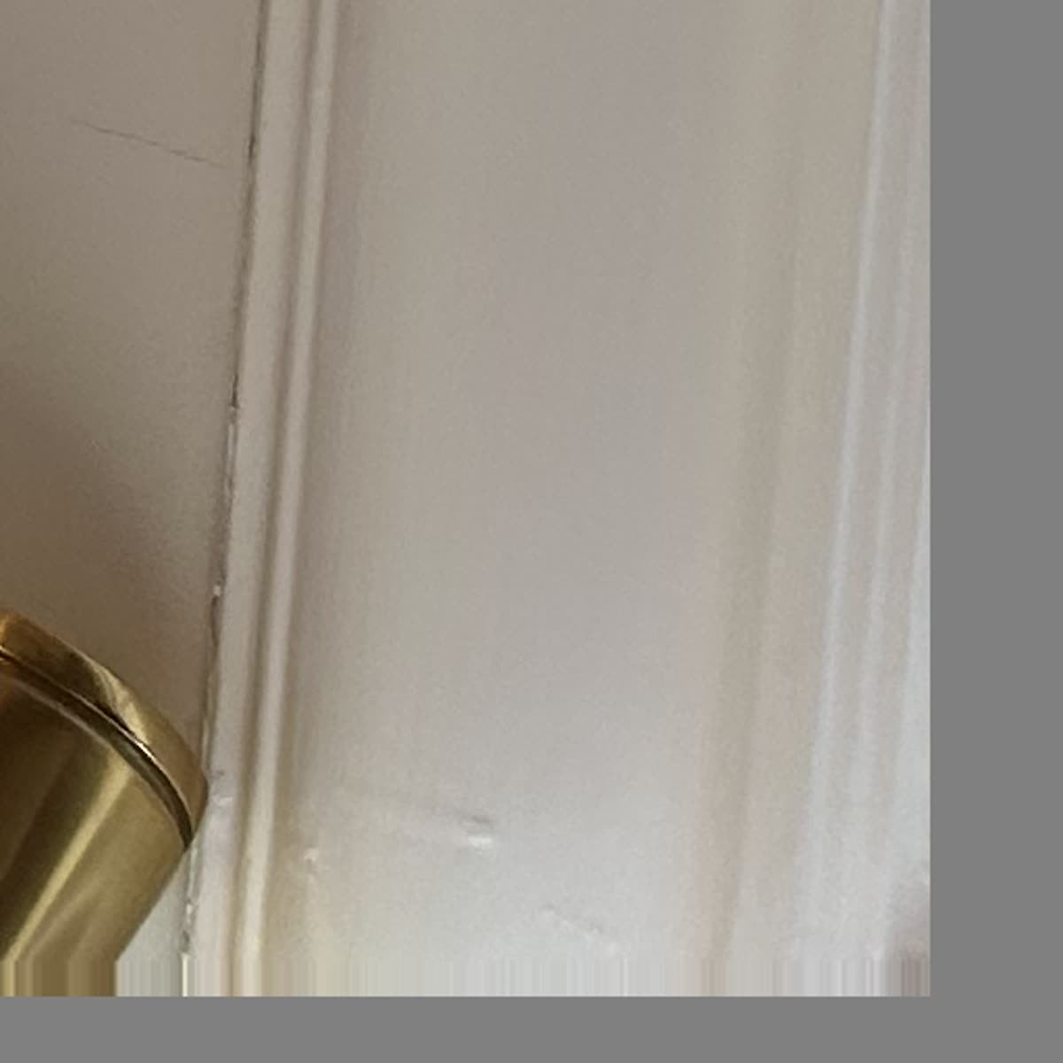 Interior ceiling crack and water damage from flat roof leak, Winnetka IL